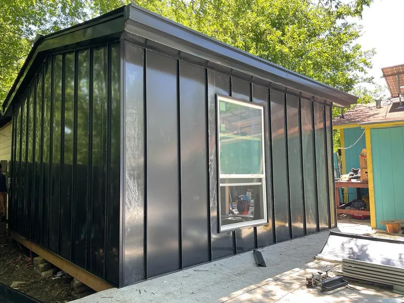 Black standing seam metal wall panels for Roof Inspection in Upper Makefield