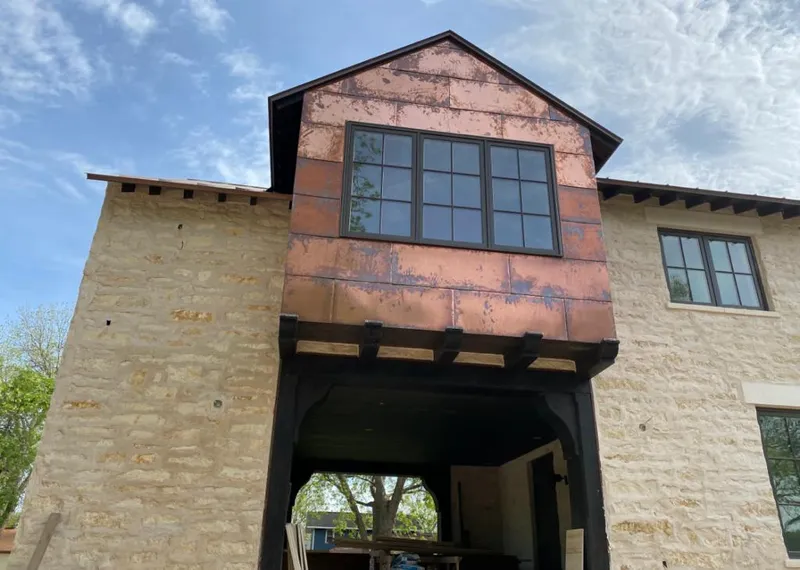 Copper metal panel facade on a stone building for Metal Roof Coating in Upper Makefield