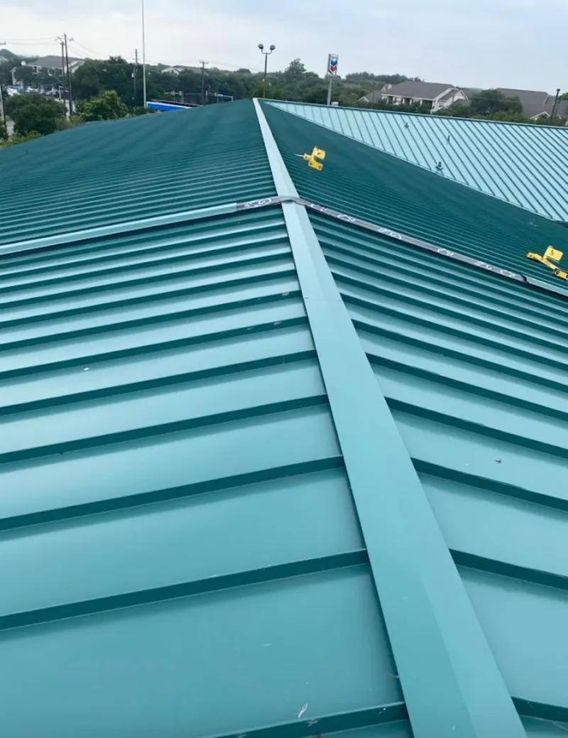 Green commercial metal roof ridge and valley for Metal Roof Repair in Upper Makefield